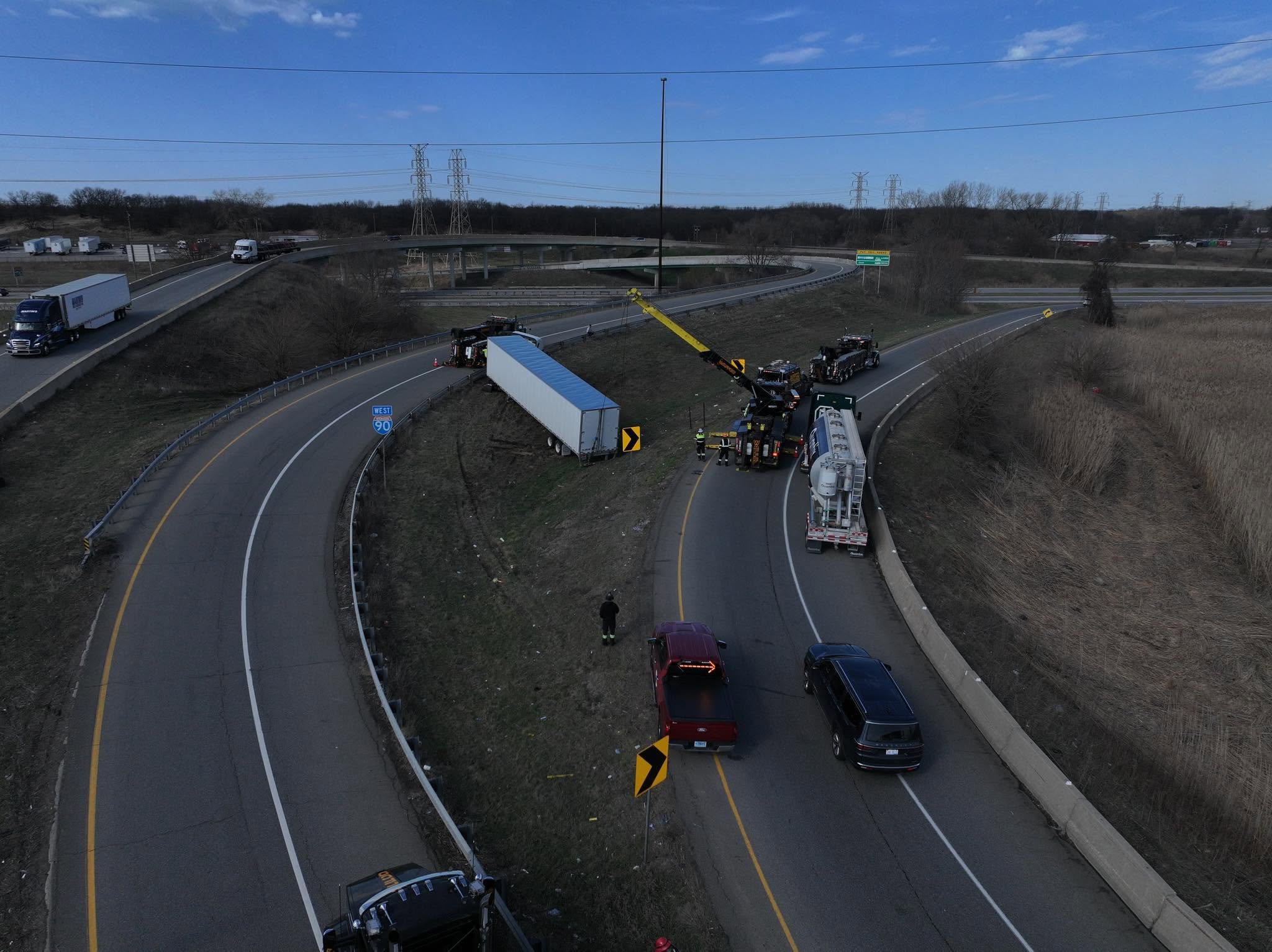Heavy recovery equipment on an interstate ramp