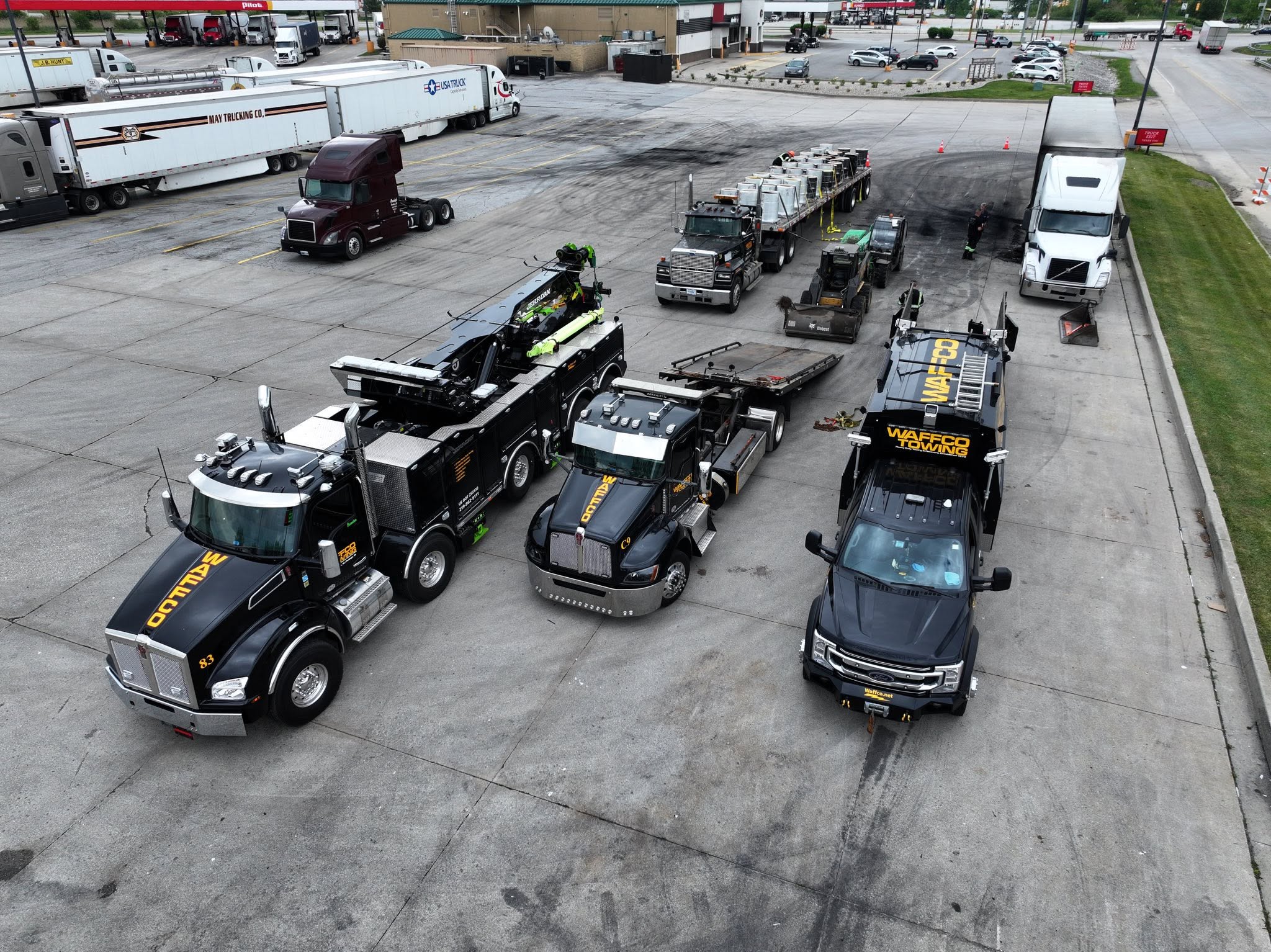 Waffco rotator, wrecker, carrier and support equipment on a job