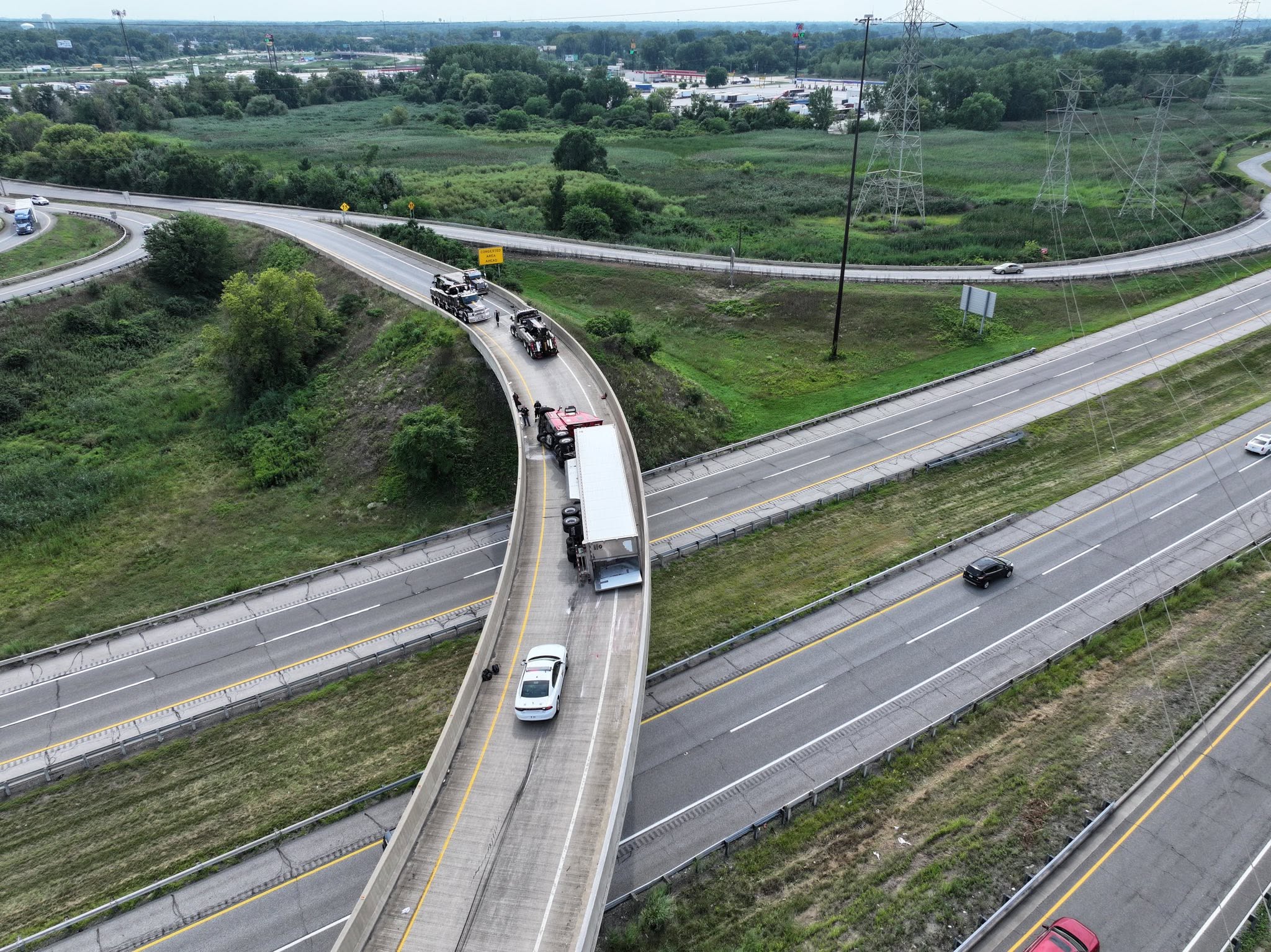 Aerial view of recovery work on a highway interchange ramp