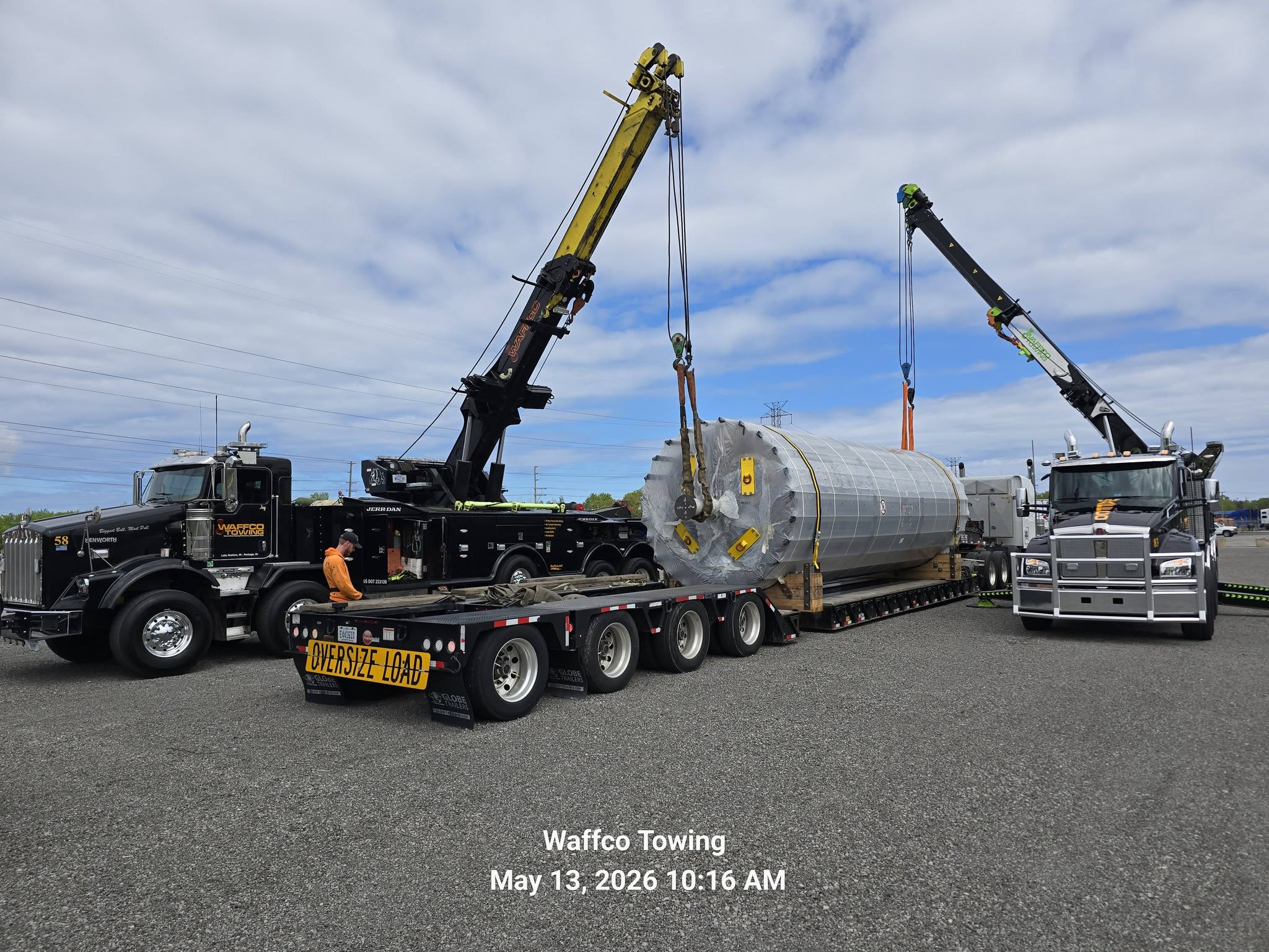 Two Waffco rotators lifting an oversized industrial load