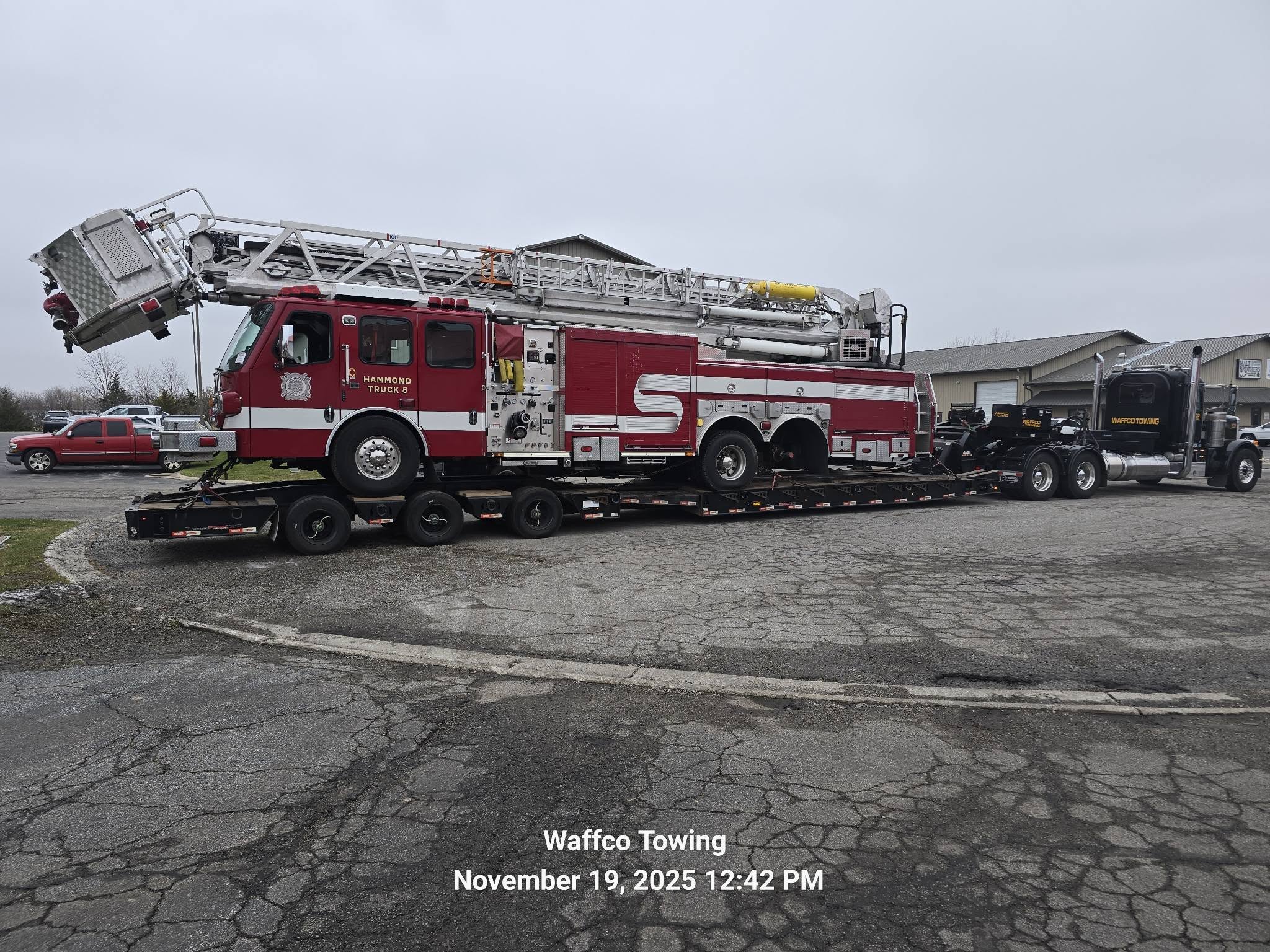 Waffco transporting a fire truck